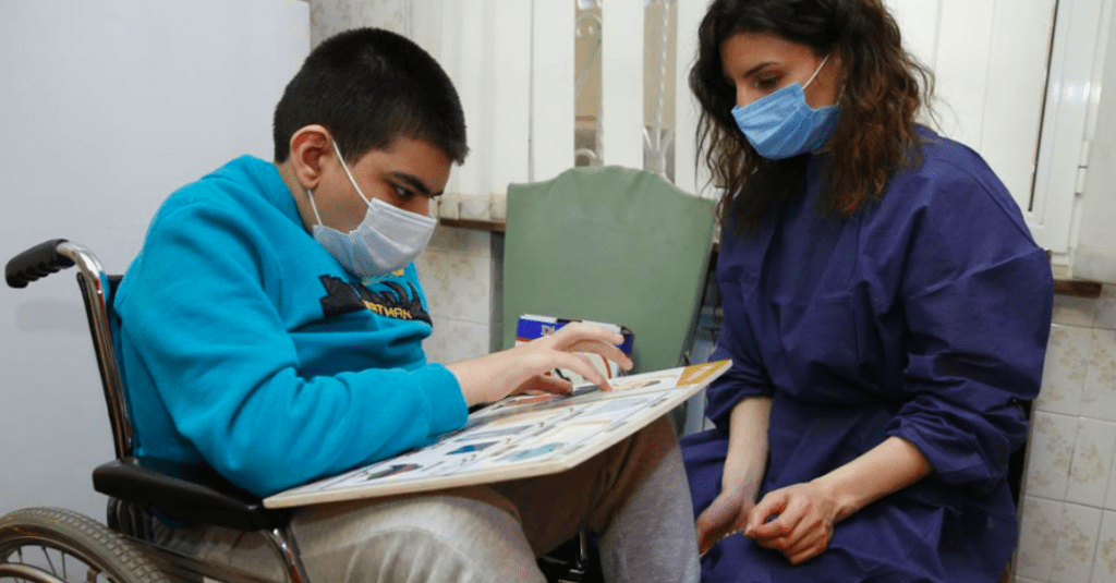 A disabled boy continues his education during the COVID-19 pandemic in Armenia.
