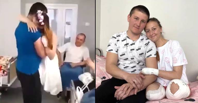 A Ukrainian nurse who lost her legs in a landmine explosion has shared an emotional first dance with her husband after getting married in a hospital.